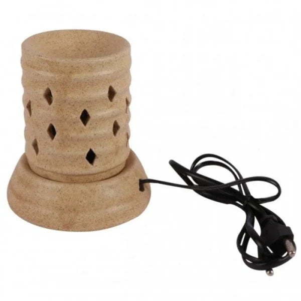 Ceramic electric aroma oil diffuser with cut-out design and black power cord on white background